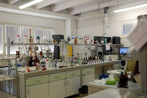 Fully equipped laboratory interior with instruments and workbenches